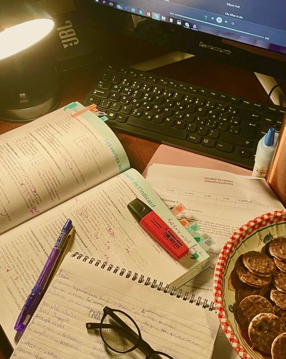 Late night work desk of a student trying succeed in college when you come from a poor family