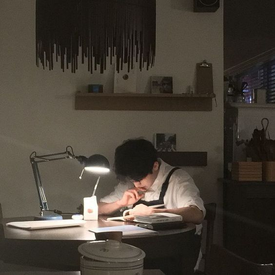  boy working in the night to try learning to focus and take care of himself